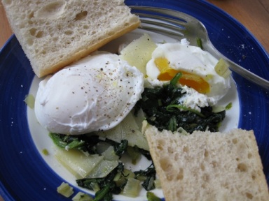 Poached eggs with spinach and green garlic